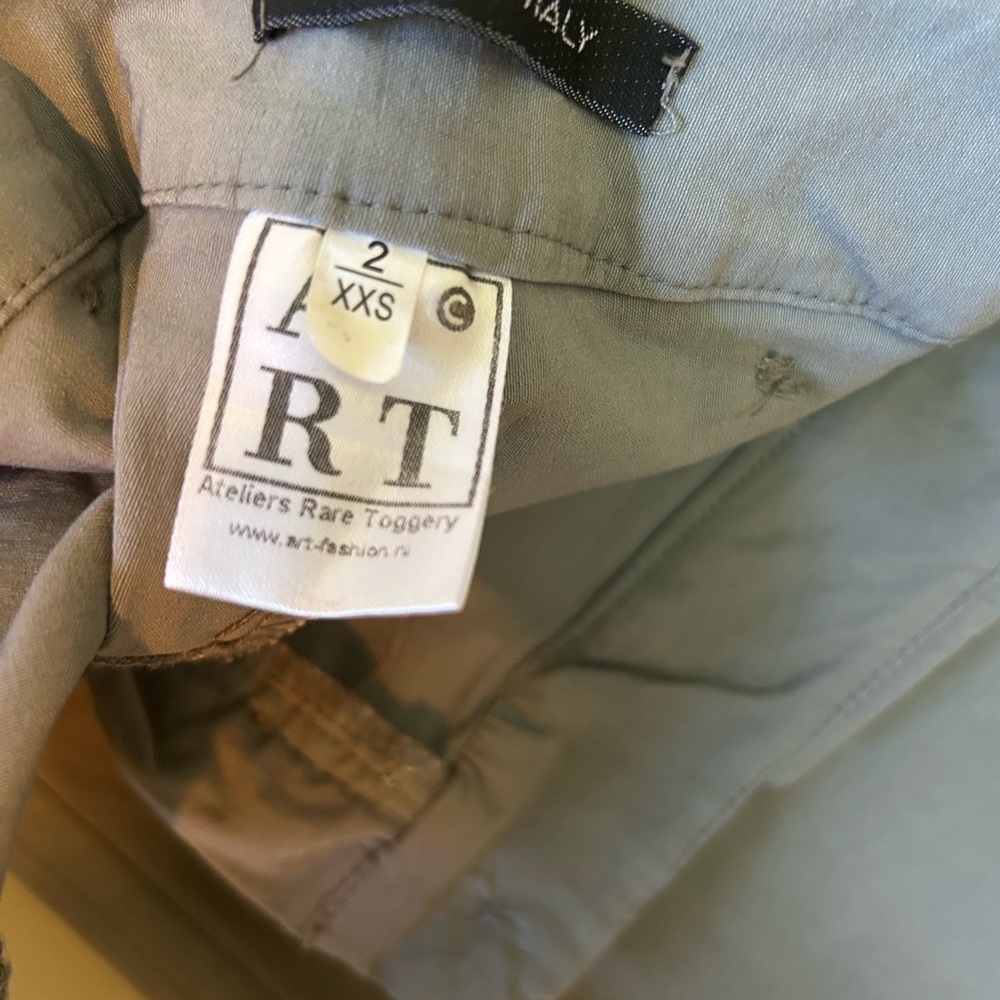 Absolutely stunning Ateliers Rare Toggery pants with detailed button pockets.